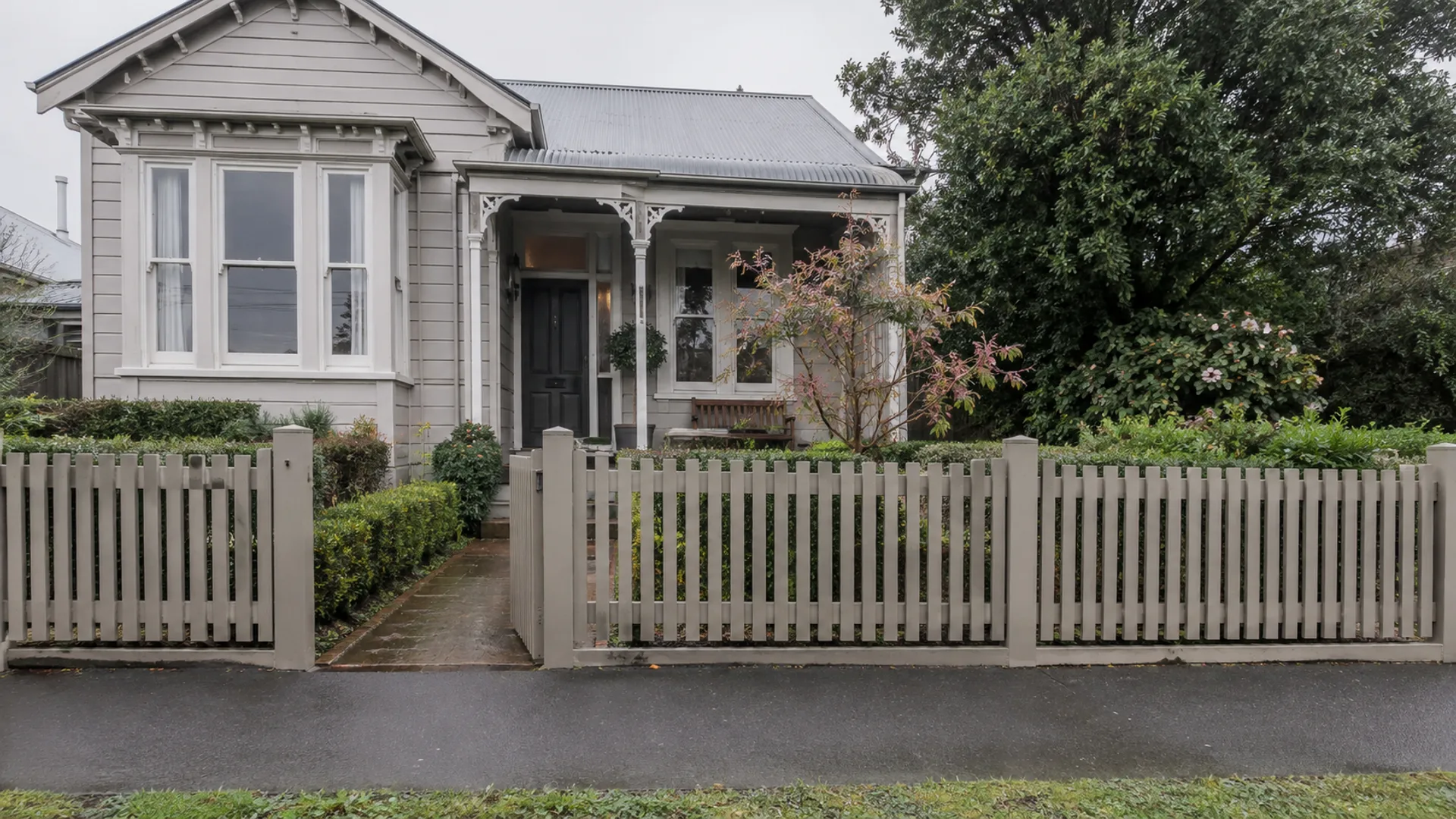 Character fence outside a pre-1940s Christchurch villa